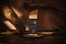 Momentum 100ml bottle and box on driftwood, House of Watan Elan