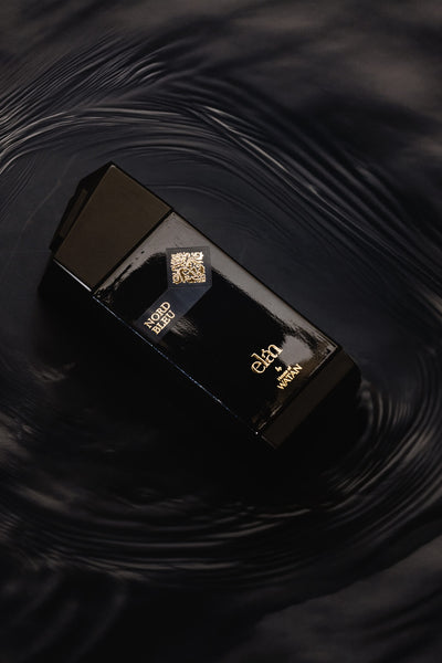Nord Bleu Eau de Parfum bottle on dark water, fresh aromatic blue fragrance