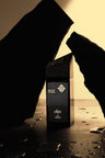 Silent Storm Eau de Parfum bottle with dark sculptural forms