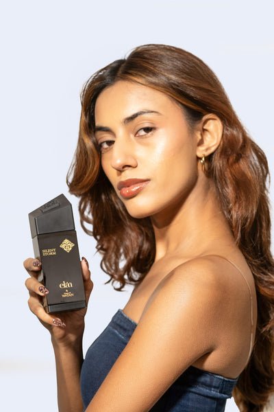 Woman holding Silent Storm box, House of Watan Elan series